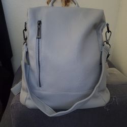 Light Gray Leather Backpack. 