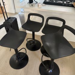 4 Adjustable Barstools 