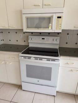 GE Electric Stove + Whirlpool Microwave