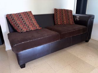 Brown Sofa with Patterned Cushions