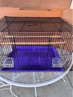 Bird or Bunny Cage With Purple Base.