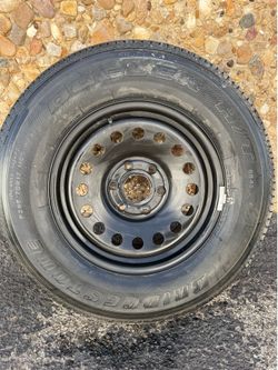 Gm/Chevy never used  oem full size spare Bridgestone tire with rim