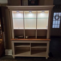 curio cabnets and sofa table / bookcase