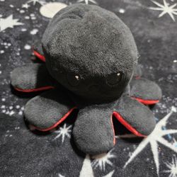 mood octopus plush toy (black and red). 