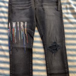 Amiri Paint Drip Logo Jeans