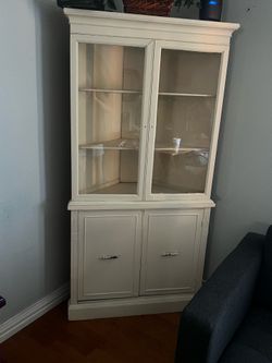 Curio corner cabinet
