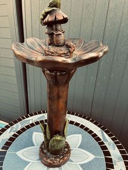 Bird bath made out of concrete