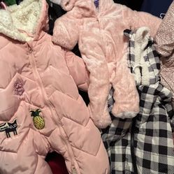 Snowsuits 0-3,  3-6..6 months..New And New Condition..$15, & $20 Each.. (Sweater With Hood stripe Multi Colors!!$15..) Black And White With Hood NEW!!