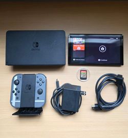 Nintendo Switch OLED -Super Smash Bros Edition- w/ dock, joycon charger stand, and 1 Game