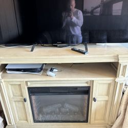 65 INCH SONY TV With TV STAND/ FIRE PLACE