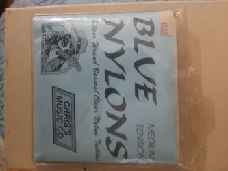 guitar strings with silver wound basses and clear nylon trebles
