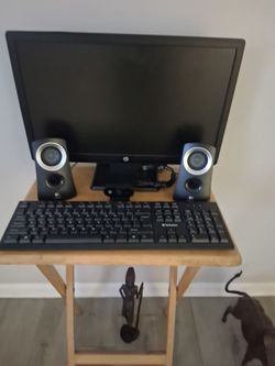 Two walkie talkie and a old school phone collectable and computer set with camera