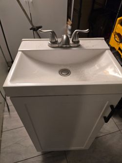 White Bathroom Vanity with Sink and Faucet