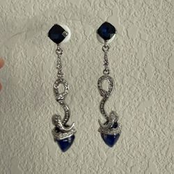 Women’s blue and silver snake shaped Earrings