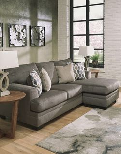 Ashley sectionals or New Ashley sofa and love seat at wholesale Furniture Center 25 w 39th street Kansas City mo 64111