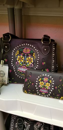 Skull candy purse matching wallet. New