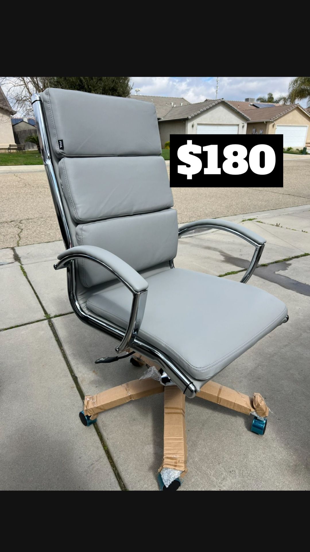 Brand New. Light Grey/chrome High Back Executive Office Chair. Retails Around $400. Fully assembled