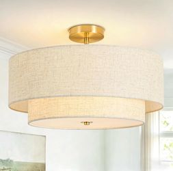 Modern 2-tier drum semi flush mount ceiling light with a stylish gold finish and linen fabric shade. Perfect for the dining room, living room, bedroom