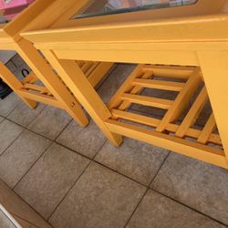 Two yellow end tables 