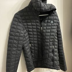 Reebok quilted puffer jacket in size Large.