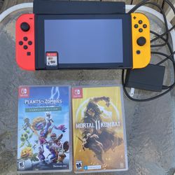 Nintendo Switch + Games 