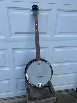 S101 guitars brand Banjo - in excellent condition   Not sure about the history behind this instrument, but it looks to be in Excellent shape. I put it
