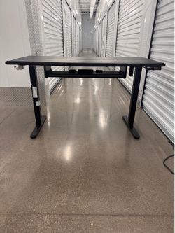 ADJUSTABLE DESK ($50)