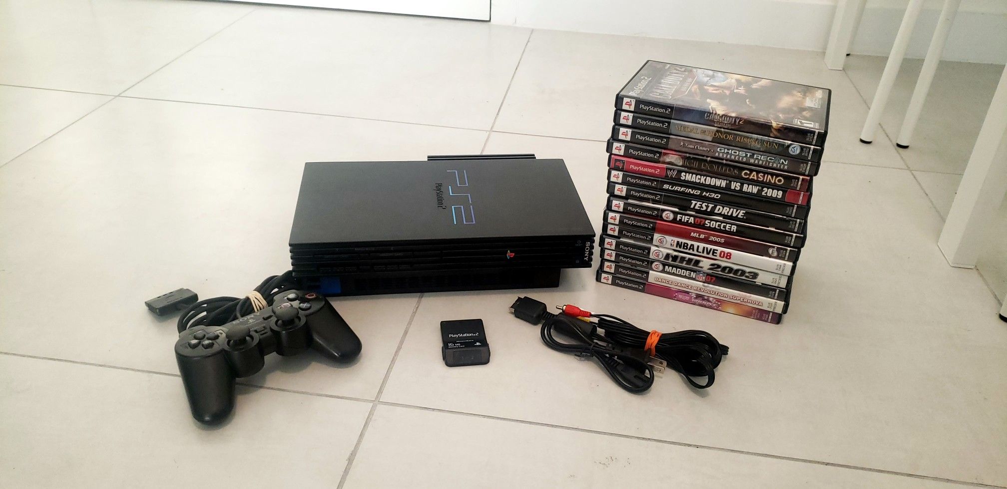 Ps2 Fat in Great condition with games