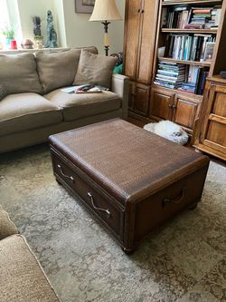 Coffee table with storage drawer
