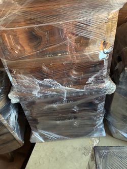 Like new four drawer cabnet wrapped in plastic for protection