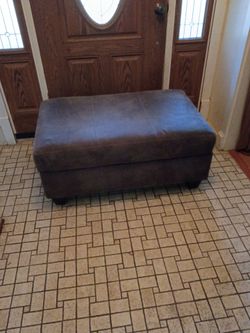 Grey ottoman with inside storage/42 x 26 x 19 inches