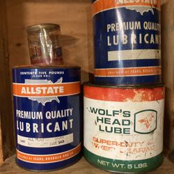 Three Vintage grease Cans
