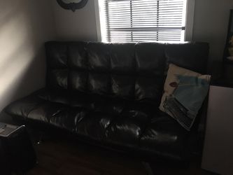 Black faux leather click clack futon