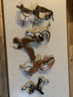 Spurs for sale. Four pairs