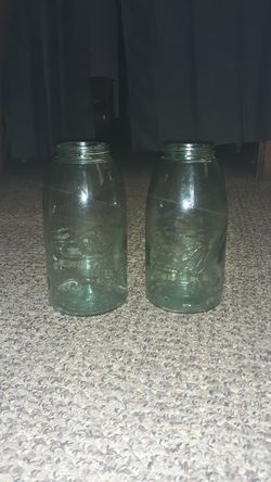 2 half gallon Ball Mason dark green tinted glass with number bottoms only 30$