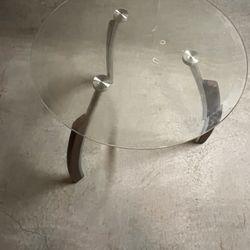 1 Round Tempered Glass End Table with Brown Trim Asking 20.00