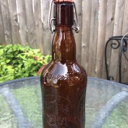 Grolsch Beer Bottle With Stopper On Top 