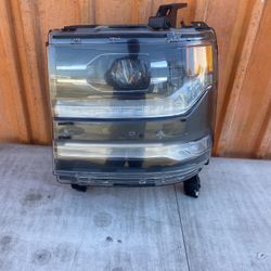 Headlight Chevy Silverado 1500 OEM   Left Driving Side  Good.  Used.  2016-2017-2018 