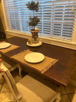 Vintage heavy table well made and 4 chairs