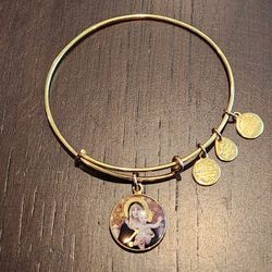 2017 Alex & Ani charm bracelet 
"Madonna of the lilies"

