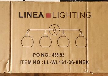 4-light vanity fixture from the Lukasa collection by Linea Lighting