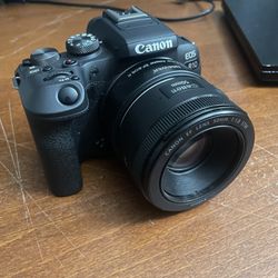 Canon R10 With 50mm Lens And Adapter