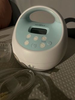 Selling a Spectra breast pump machine with charger and tubing, plus Medela breast pump parts