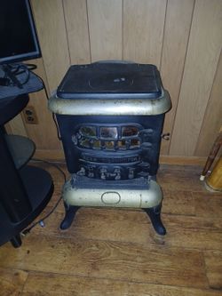 Antique wood burning stove