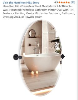 Frameless Pivot Oval Mirrors