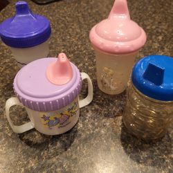 Toddler Sippy Cips lot of 4 Playtex purple, lavender with handles, pink lid, blue lid