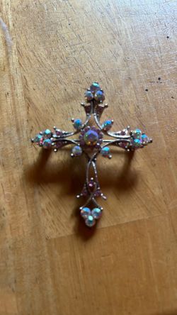 Kirk’s folly jeweled cross brooch