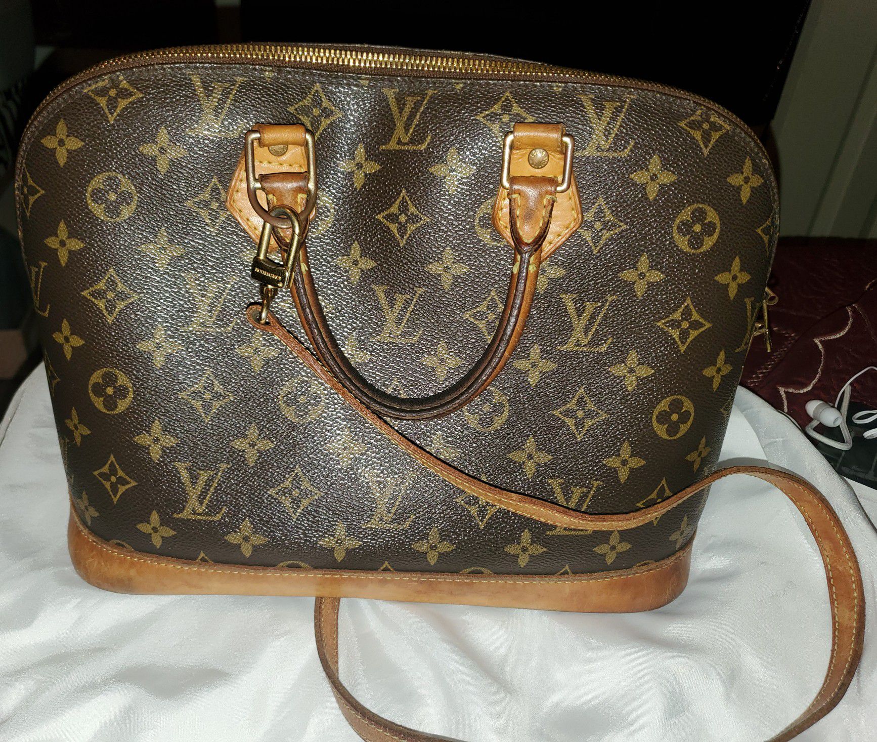 Authentic Louis Vuitton Alma handbag