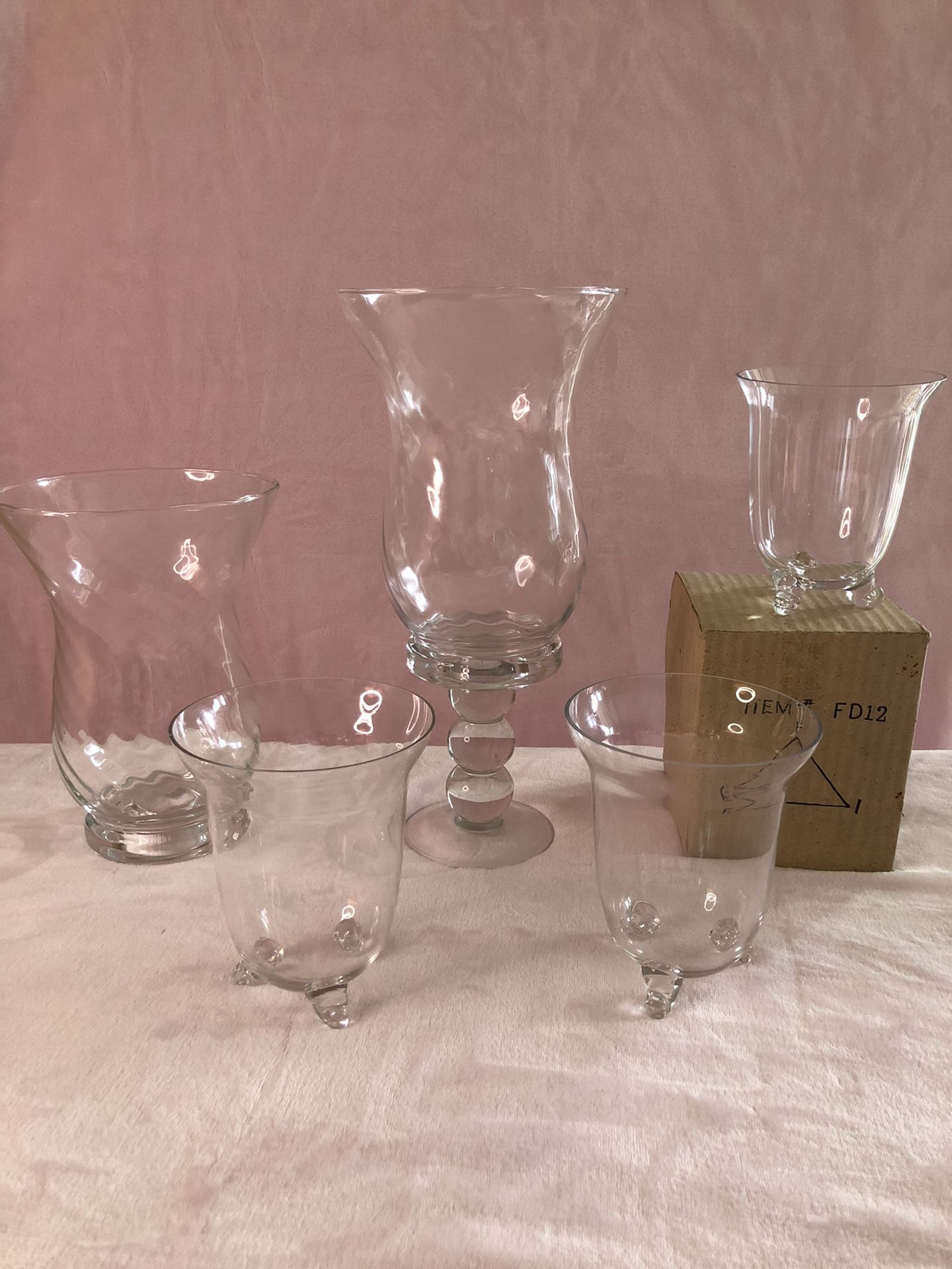75 glass vases plus 4 taller vases