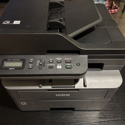 Brother DCP-L2640DW Wireless Compact Monochrome Laser Multifunction Printer. 